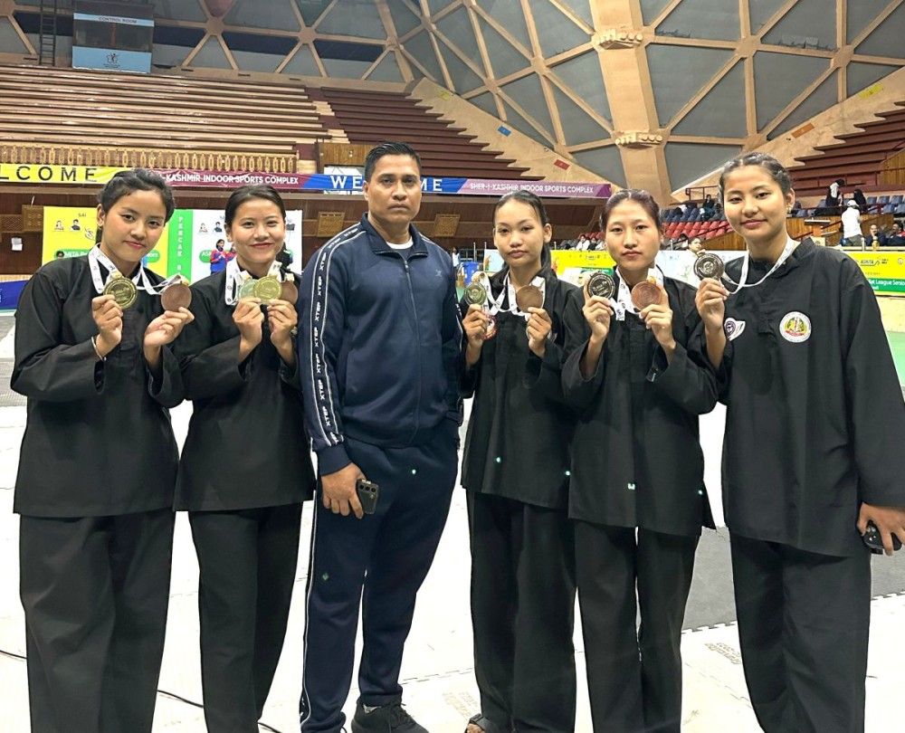Medal winners from Nagaland’s Pencak Silat girls team with head coach Deep Kumar.